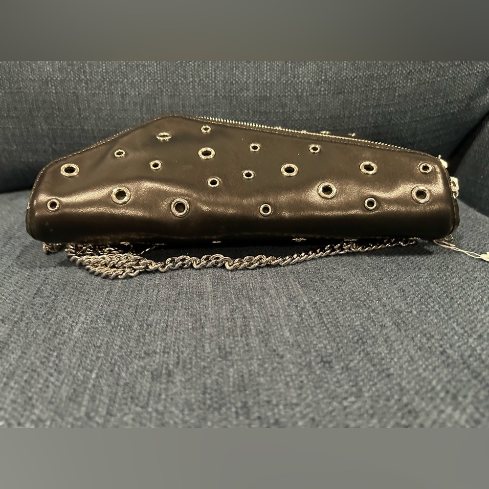 Henri Bendel's black/ silver grommet purse NWOT - Picture 4 of 10